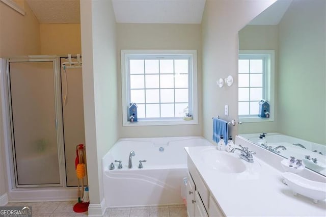 152 Cooper Creek Dr, Dallas, GA 30157 - bathroom featuring tile patterned flooring, a garden tub, vanity, and a stall shower