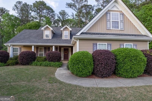 152 Cooper Creek Dr, Dallas, GA 30157 - view of front of home featuring board and batten siding, a shingled roof, and a front yard