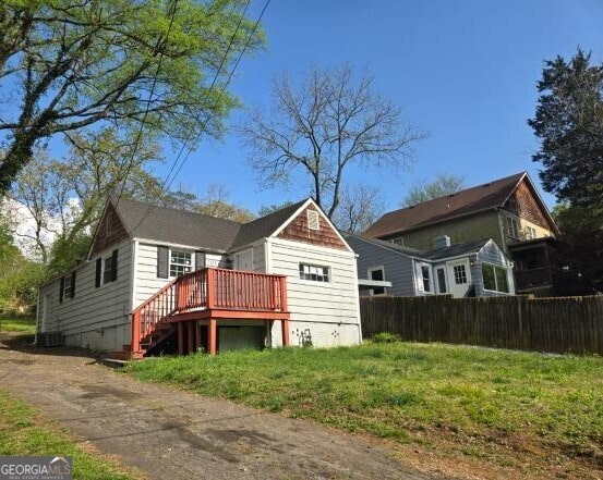 2016 Conrad Ave SE, Atlanta, GA 30315 - exterior space with fence, a deck, and stairs