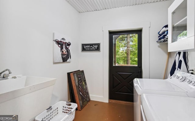 laundry area featuring washing machine and dryer