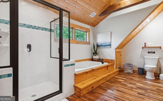 full bathroom featuring wood finished floors, a garden tub, a shower stall, toilet, and wooden ceiling
