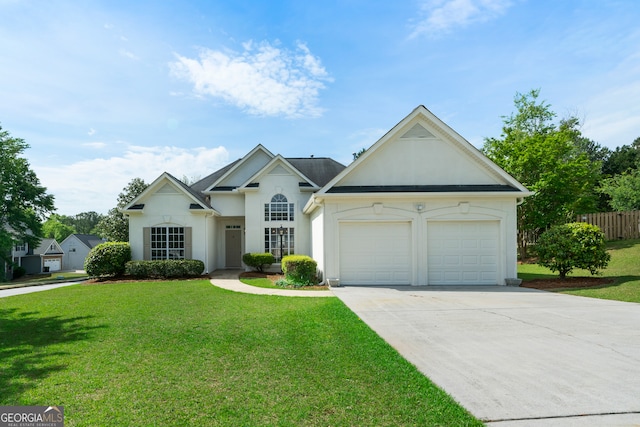 3047 Standing Rock Ct, Lithia Springs, GA 30122 - single story home with concrete driveway, fence, an attached garage, a front yard, and stucco siding