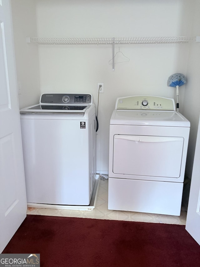 laundry room featuring laundry area and separate washer and dryer