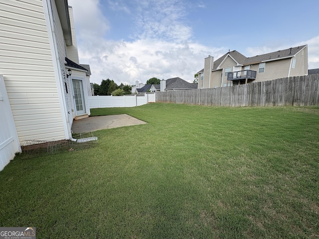 view of yard featuring a fenced backyard and a patio area