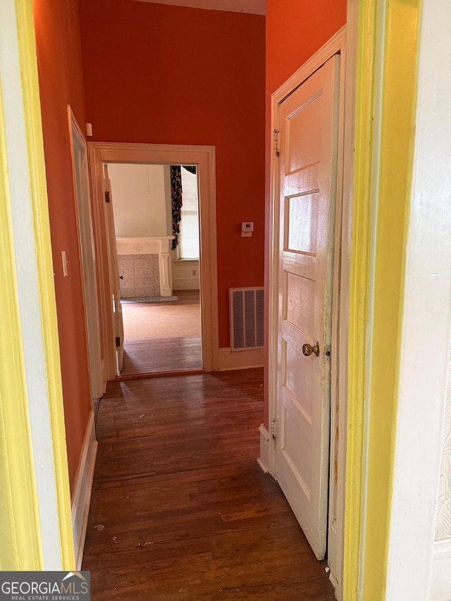 967 Cole St, Macon, GA 31201 - hallway featuring dark wood finished floors, visible vents, and baseboards