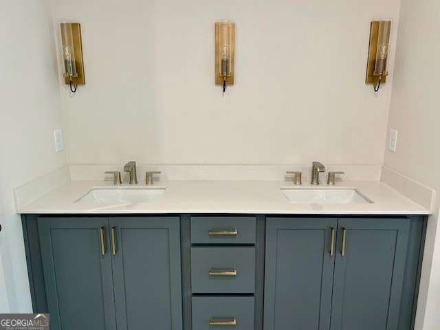 bathroom featuring double vanity and a sink