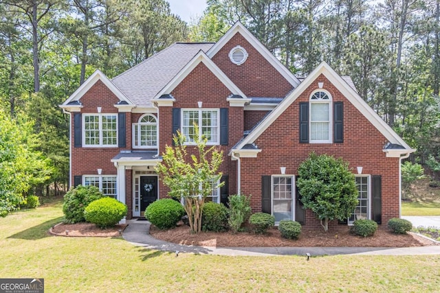 4319 Silver Peak Pkwy, Suwanee, GA 30024 - view of front of property with brick siding and a front yard