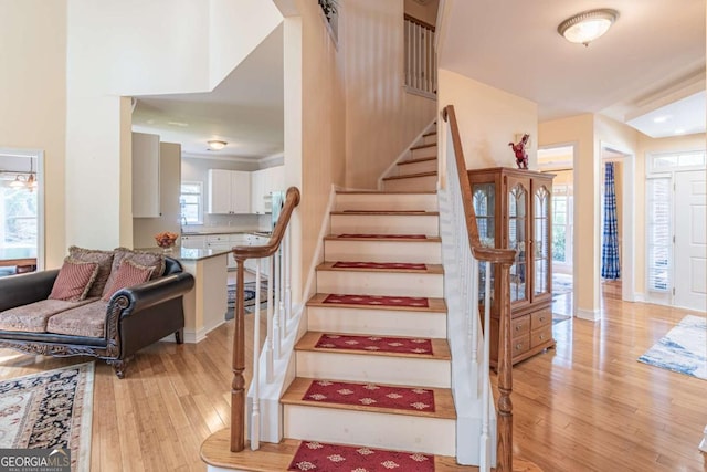 4319 Silver Peak Pkwy, Suwanee, GA 30024 - staircase with wood-type flooring
