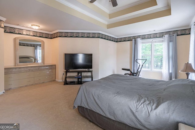 4319 Silver Peak Pkwy, Suwanee, GA 30024 - carpeted bedroom featuring baseboards, a tray ceiling, ornamental molding, and ceiling fan