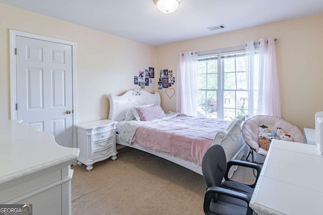 4319 Silver Peak Pkwy, Suwanee, GA 30024 - bedroom featuring visible vents and light carpet