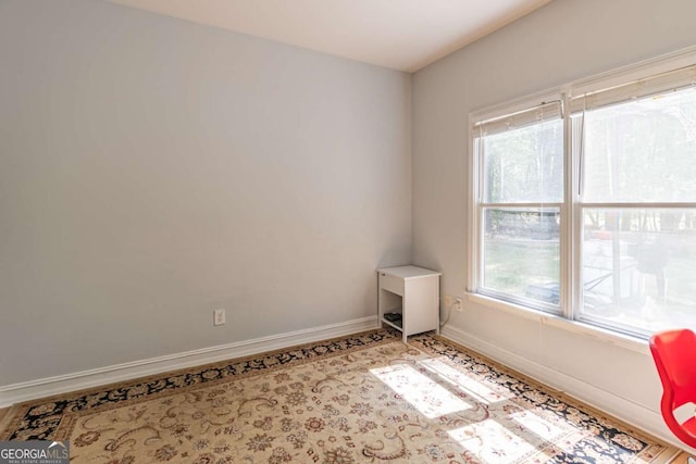 4319 Silver Peak Pkwy, Suwanee, GA 30024 - spare room featuring baseboards