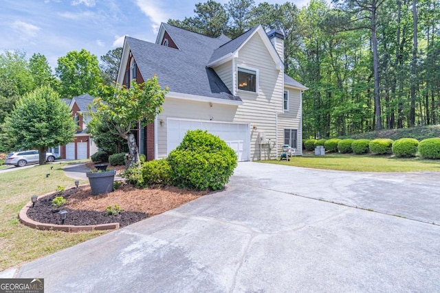 4319 Silver Peak Pkwy, Suwanee, GA 30024 - view of property exterior with driveway, a chimney, roof with shingles, and a lawn