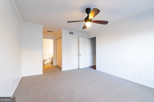2657 Lenox Road Ne 68Bldg E, Atlanta, GA 30324 - unfurnished bedroom featuring carpet, visible vents, baseboards, and ornamental molding