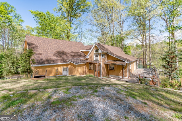 9240 Lisa Cir, Gainesville, GA 30506 - view of front of property featuring a shingled roof, board and batten siding, and a front yard