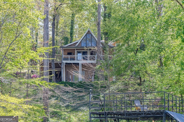 9240 Lisa Cir, Gainesville, GA 30506 - back of house featuring a wooden deck