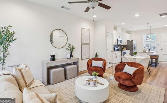 1095 Tucker Ave Unit 207, Atlanta, GA 30310 - living room with ceiling fan, light wood finished floors, recessed lighting, and baseboards