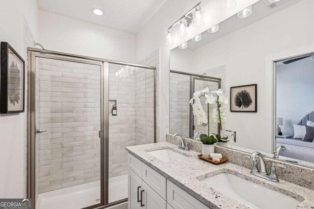 1095 Tucker Ave Unit 207, Atlanta, GA 30310 - full bathroom featuring a shower stall, double vanity, and recessed lighting