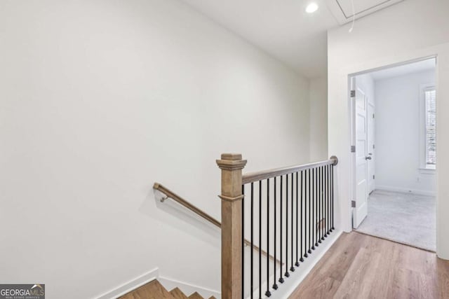 1095 Tucker Ave Unit 207, Atlanta, GA 30310 - stairway with attic access, wood finished floors, baseboards, and recessed lighting