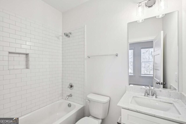 1095 Tucker Ave Unit 207, Atlanta, GA 30310 - full bathroom featuring toilet, vanity, and washtub / shower combination