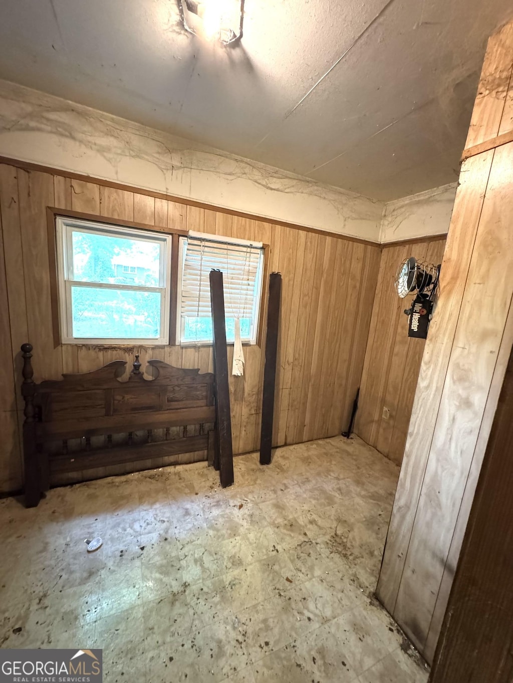 below grade area with wood walls