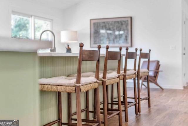 2180 Pine Lake Rd, Hiawassee, GA 30546 - dining room with wood finished floors and baseboards