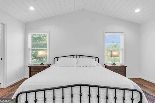 2180 Pine Lake Rd, Hiawassee, GA 30546 - bedroom featuring lofted ceiling, baseboards, and wood finished floors