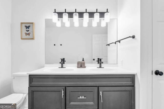 2180 Pine Lake Rd, Hiawassee, GA 30546 - full bathroom featuring double vanity, toilet, and a sink