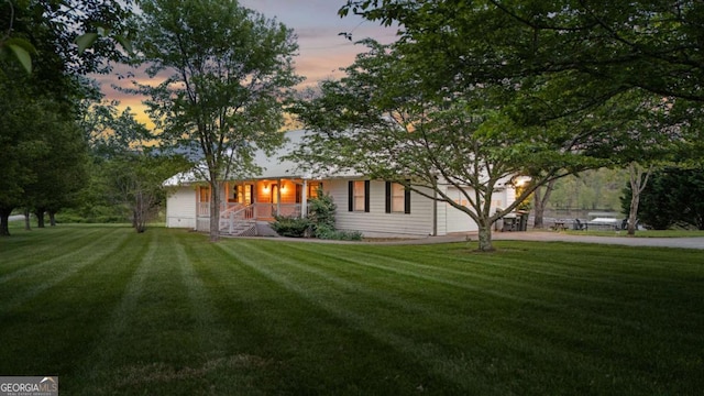 2180 Pine Lake Rd, Hiawassee, GA 30546 - exterior space with a lawn and a porch