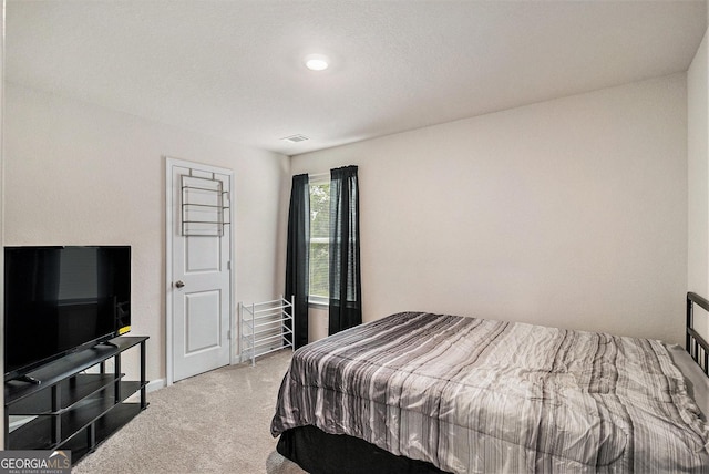 231 Limestone Cir, Conyers, GA 30013 - bedroom featuring recessed lighting, light carpet, visible vents, and baseboards