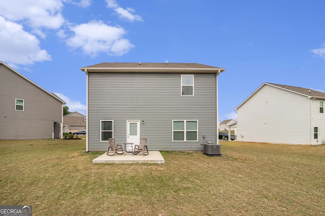 231 Limestone Cir, Conyers, GA 30013 - back of house featuring a patio area, a lawn, and central AC unit