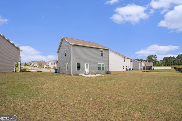 231 Limestone Cir, Conyers, GA 30013 - back of house featuring a residential view, a yard, cooling unit, and a patio