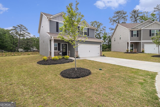 231 Limestone Cir, Conyers, GA 30013 - view of front of house with a front lawn, driveway, stone siding, an attached garage, and board and batten siding