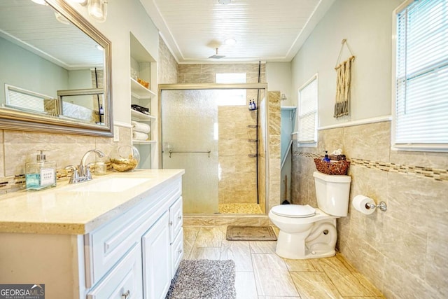 98 Chappell Rd NW, Atlanta, GA 30314 - full bath featuring tile walls, toilet, vanity, and a stall shower