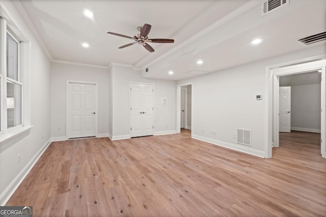 interior space with visible vents, recessed lighting, light wood-style floors, and crown molding