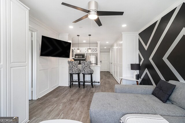 215 Piedmont Ave NE Unit 2210, Atlanta, GA 30308 - living room with recessed lighting, light wood-type flooring, a decorative wall, and ceiling fan