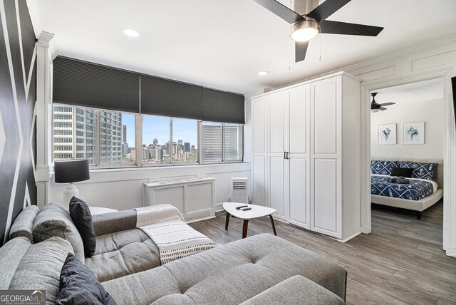 215 Piedmont Ave NE Unit 2210, Atlanta, GA 30308 - living room with ceiling fan, a city view, wood finished floors, and recessed lighting