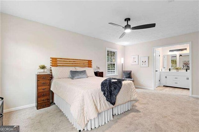 bedroom featuring carpet floors, baseboards, and multiple windows