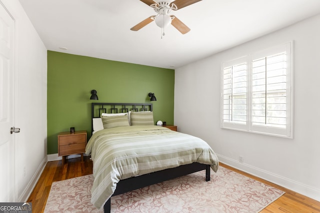 24 Daniel St SE # 3, Atlanta, GA 30312 - bedroom with ceiling fan, baseboards, and wood finished floors