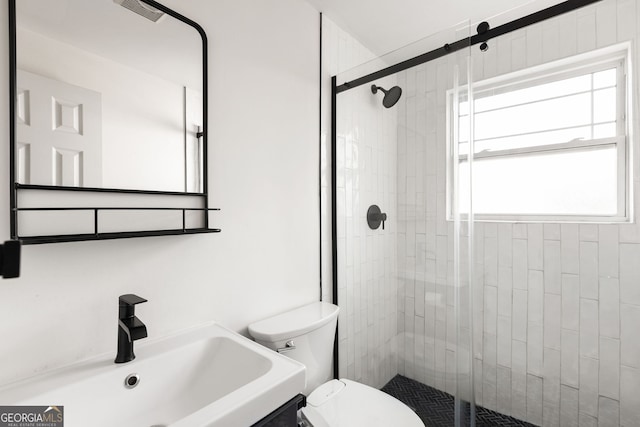 24 Daniel St SE # 3, Atlanta, GA 30312 - bathroom with toilet, a sink, visible vents, and a stall shower