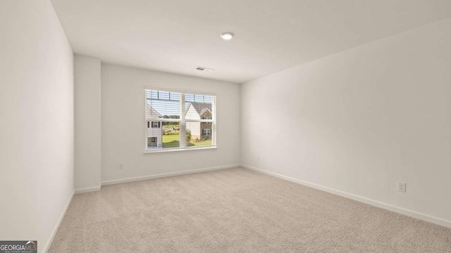 1109 Blue Juniper Cir, Loganville, GA 30052 - spare room with carpet floors and baseboards