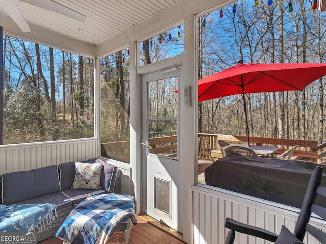 sunroom with an outdoor hangout area