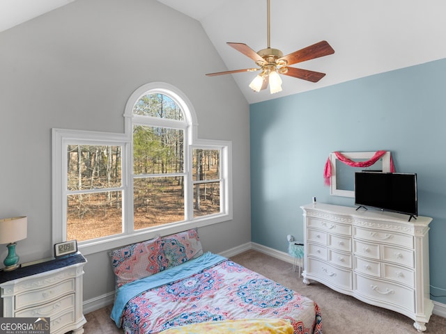 bedroom featuring carpet flooring, a ceiling fan, and high vaulted ceiling