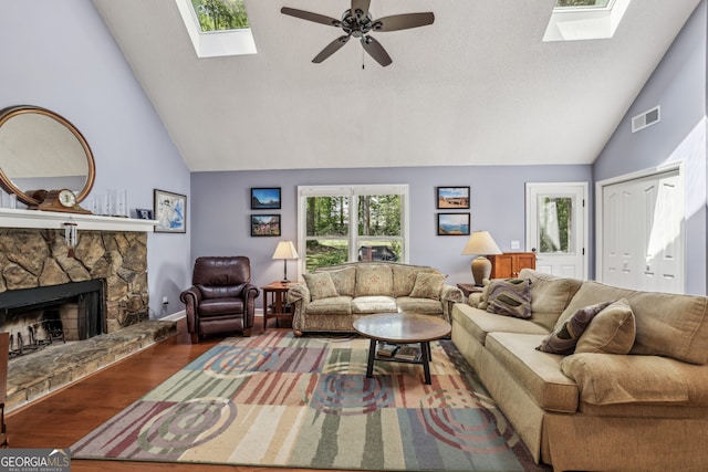 1390 Barclay Dr, Lawrenceville, GA 30043 - living room featuring visible vents, a skylight, high vaulted ceiling, and a ceiling fan
