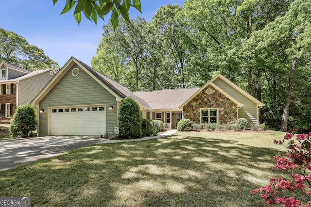 1390 Barclay Dr, Lawrenceville, GA 30043 - view of front of house with an attached garage, a front yard, aphalt driveway, and stone siding