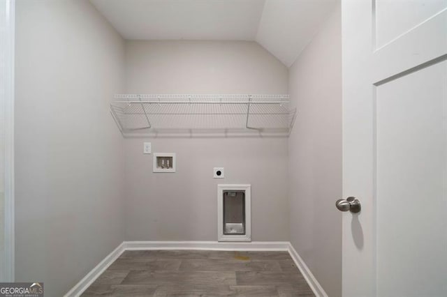 laundry room with hookup for an electric dryer, dark wood-style floors, washer hookup, and baseboards