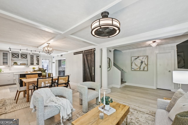 285 Lakemoore Dr NE Unit A, Atlanta, GA 30342 - living area featuring light wood-type flooring, baseboards, coffered ceiling, and a barn door
