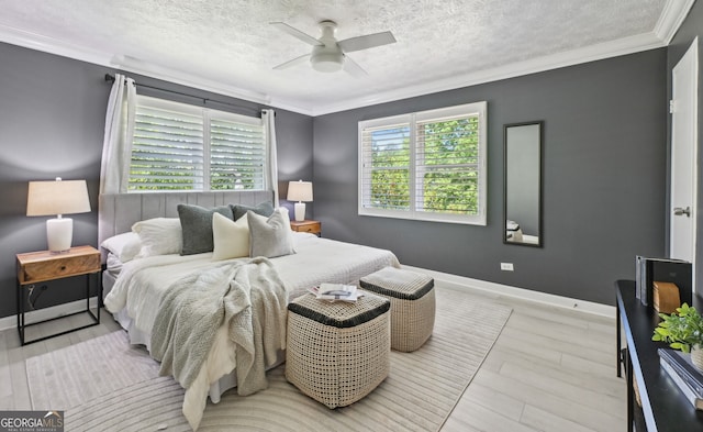 285 Lakemoore Dr NE Unit A, Atlanta, GA 30342 - bedroom featuring a ceiling fan, baseboards, crown molding, and a textured ceiling