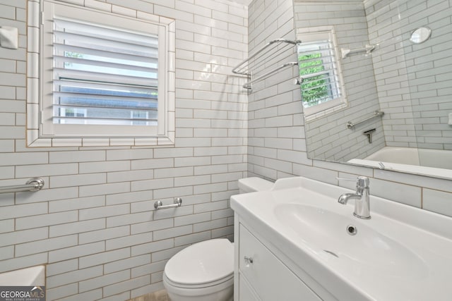 285 Lakemoore Dr NE Unit A, Atlanta, GA 30342 - full bath featuring toilet, vanity, and tile walls