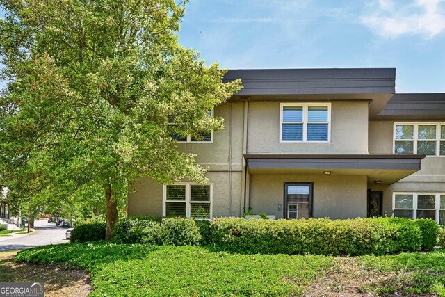 285 Lakemoore Dr NE Unit A, Atlanta, GA 30342 - view of front of house with stucco siding