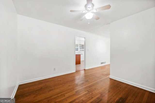 3050 Rebecca Dr SW, Atlanta, GA 30311 - unfurnished room with wood finished floors and a ceiling fan
